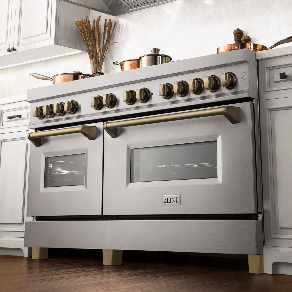 ZLINE Autograph Edition 60" 7.4 cu ft Dual Fuel Range with Gas Stove and Electric Oven in DuraSnow Stainless Steel with Champagne Bronze Accents (RASZ-SN-60-CB)